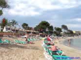 Es Cana beach sunlounging